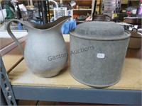 tin pitcher and oil tin