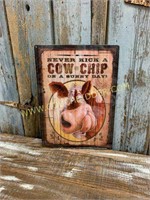 Never Kick a Fresh Cow Chip Sign
