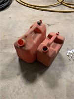 TWO SMALL GAS CANS