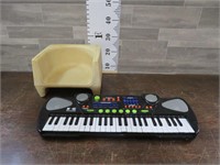 TOY ORGAN MISSING BATTERY  COVER / BOOSTER SEAT