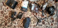 assorted cameras parts and accessories