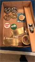 Lot of belt buckles, buttons, and bottle opener