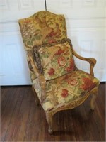 UPHOLSTERED CHAIR WITH CARVED WALNUT ARMS & LEGS
