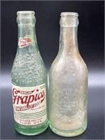 Grapico Soda Bottle and A.D. Huesing Rock Island