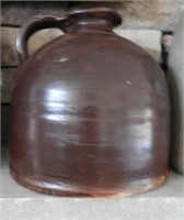 Primitive redware handled jug 7”