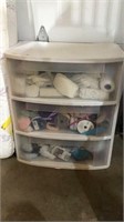 Plastic storage w/ sewing contents