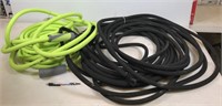 50' water hose and 50' soaker hose. May contain