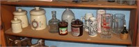 shelf of canisters and steins