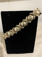 Women’s 7 inch yellow gold love bracelet. Looks