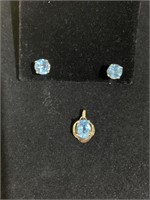 14 karat blue topaz pendant and Topez stud