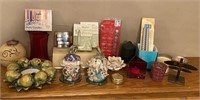 Assortment of Decorative Candles and Candle