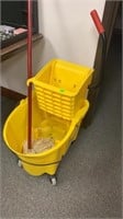 Rubbermaid Mop bucket on wheels and mop