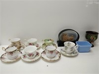 lot of tea cups and saucers, pyrex dish, cup, etc.