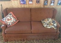 Upholstered Sofa, Pillow, and Blanket