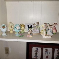 Shelf full of AVON collectibles