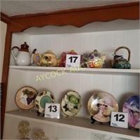 Shelf full of tea pots (5)