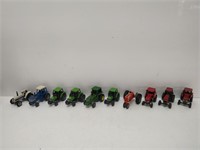 Toy tractors in planters tin