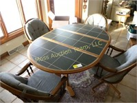 Tiled kitchen table and 4 rolling chairs