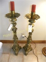 Pair of large brass candle sticks