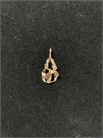 14 k nugget pendant with one small diamond.