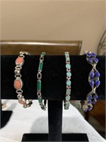 Four Native American sterling bracelets. Each one