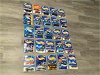 GROUP - 25 HOTWHEELS CARS IN UNOPENED PACKAGES