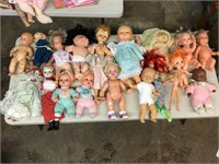 TABLE  FULL OF VINTAGE  DOLLS