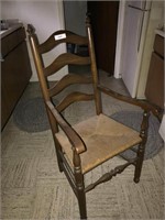 Lot #266 Brown Woven Wicker and Wood  Arm Chair