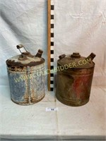 Antique galvanized oil cans