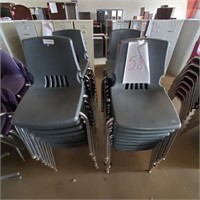 Lot of stackable grey chairs x32