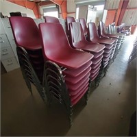 Lot of Red stackable chairs x60