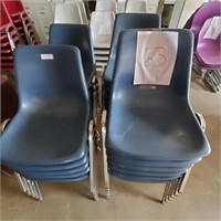 Lot of Blue stackable chairs