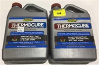 Two bottles of cooling system rust remover/flush