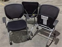 Three rolling chairs