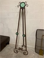 Metal easel with green glass inserts