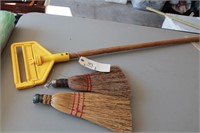 Lot of hand brooms and mop