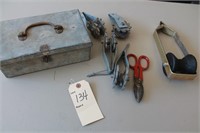 Metal box with tools and implements