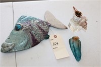 Fish sculpture, kosta boda, and seashell