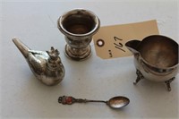 Silverplated creamer, bird, spoon, and more