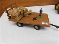 Hay wagon w/7 bales, man & dog