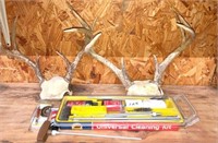 2-deer horns & gun cleaning kit