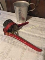 Red Metal Potato masher and alumunim pitcher