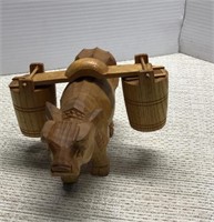 Solid woodHand carved ox carrying buckets
