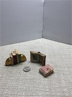 Two sets of miniature books