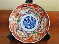 ORNATELY DECORATED ORIENTAL PLATE