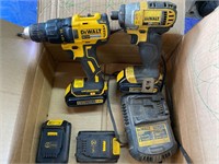 Dewalt 20v impact and drill.  Works