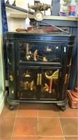 JAPANESE EBONISED AND HAND CRAFTED CURIO CABINET