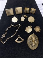 Vintage charms, cufflinks, bracelet and pendant.