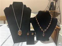 Two necklace and earring sets. Baltic amber with