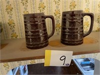 2 brown mugs - possibly McCoy
